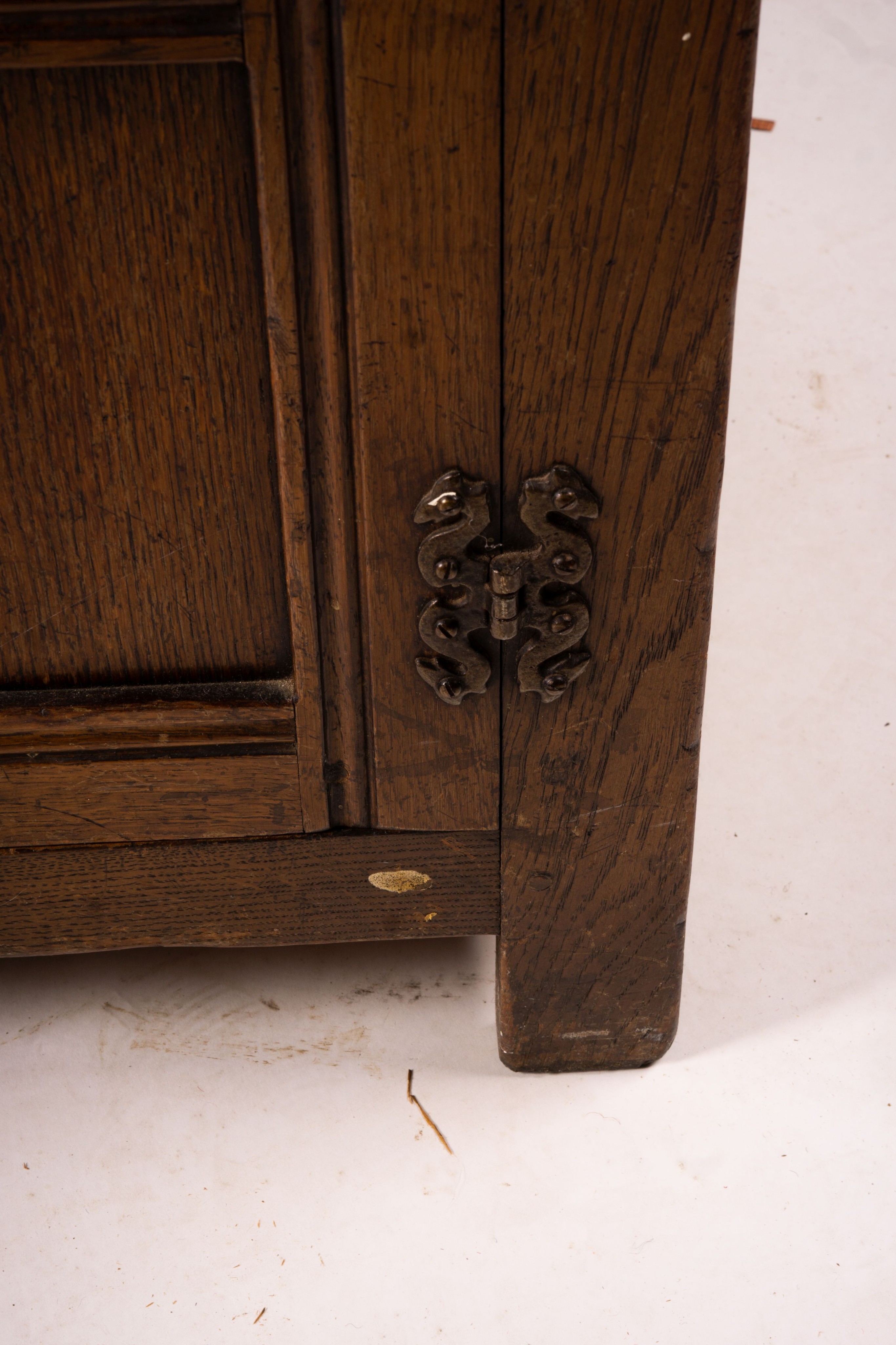 An 18th century style carved oak dresser, width 124cm, depth 46cm, height 175cm